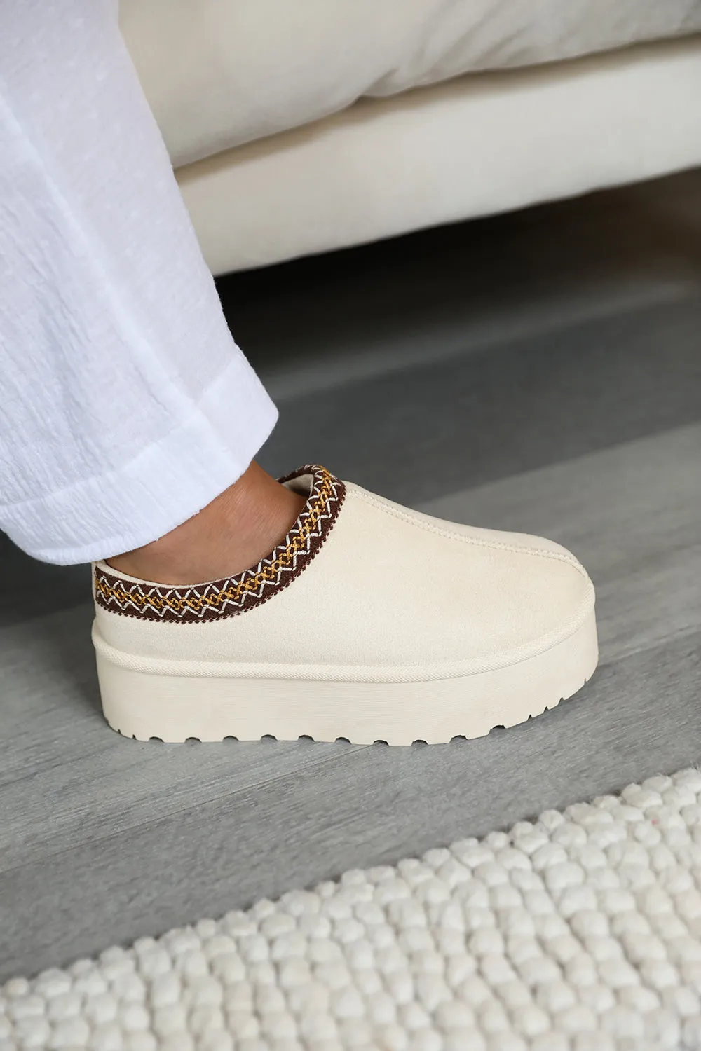 ALLEGRA FLATFORM EMBROIDERED LOW ANKLE SLIPPER BOOTS IN CREAM SUEDE